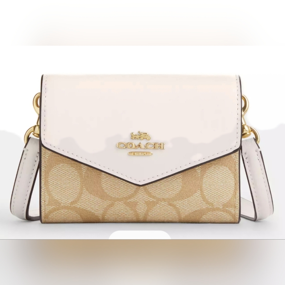 Coach Women Signature canvas mini envelope wallet mini